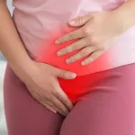 Woman hand over pelvic with endometriosis symptoms