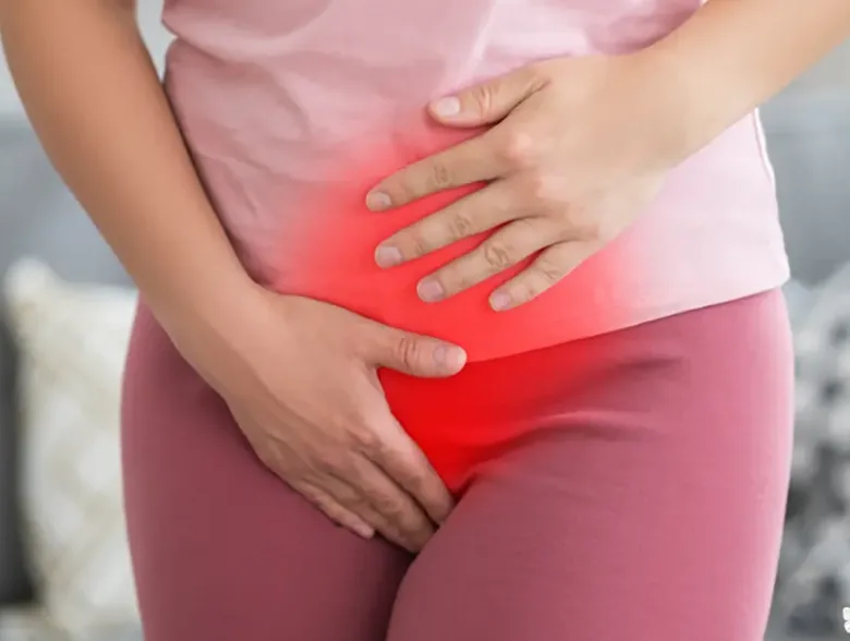 Woman hand over pelvic with endometriosis symptoms